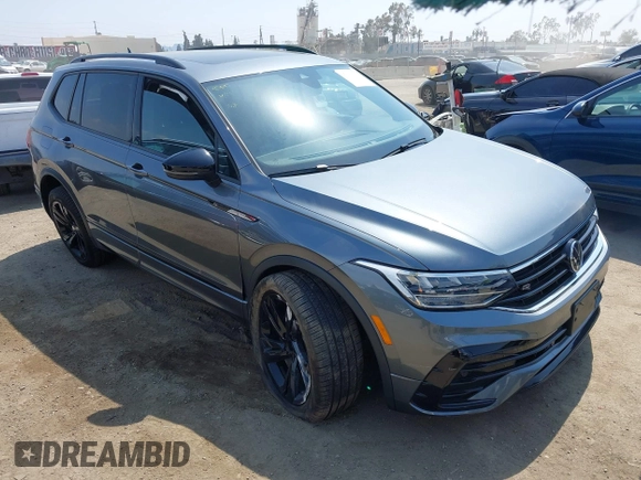 2023 Volkswagen Tiguan SE R-Line Black with VIN 3VVCB7AX8PM036684, listed as a IAAI auction lot 42169004 with 25,024 mi miles and . Bid and sale history available at DreamBid. Image 1.