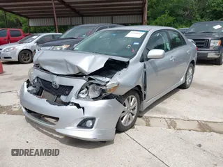 2010 Toyota Corolla with VIN 2T1BU4EE1AC480579, listed as a IAAI auction lot 42210623 with 123,795 mi miles. Bid and sale history available at carsss.com. Image 2.