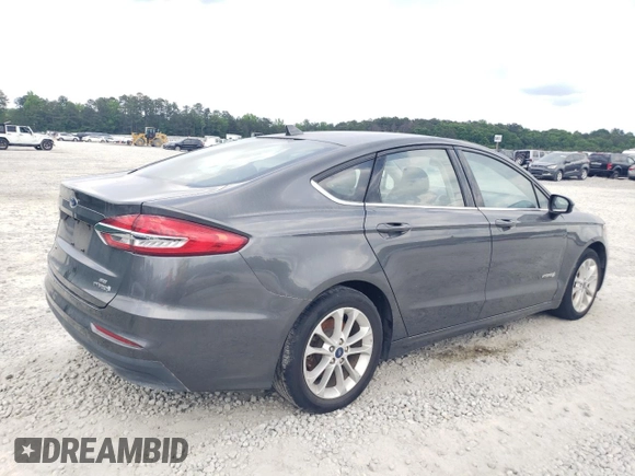 2019 Ford Fusion Hybrid SE with VIN 3FA6P0LU0KR109412, listed as a Copart auction lot 54149985 with 153,077 mi miles and Clean Title. Bid and sale history available at carsss.com. Image 3.