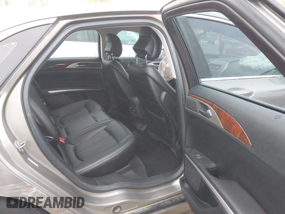 2016 Lincoln MKZ with VIN 3LN6L2G91GR614983, listed as a IAAI auction lot 42345061 with 35,977 mi miles and . Bid and sale history available at DreamBid. Image 8.