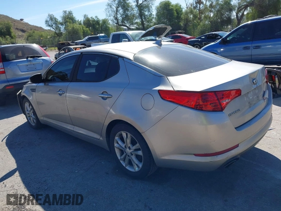 2013 Kia Optima EX with VIN 5XXGN4A7XDG128799, listed as a IAAI auction lot 41631612 with 191,124 mi miles. Bid and sale history available at carsss.com. Image 3.