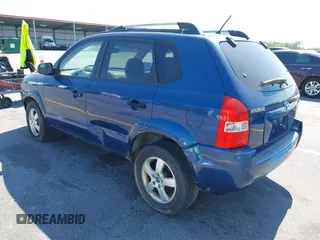 2005 Hyundai Tucson GL with VIN KM8JM12B85U233228, listed as a IAAI auction lot 42051627 with 170,742 mi miles. Bid and sale history available at carsss.com. Image 3.