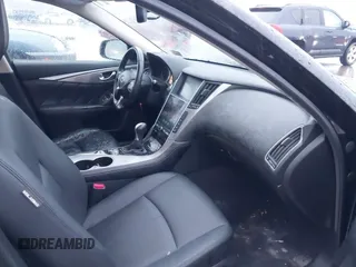 2015 Infiniti Q50 Premium z VIN JN1BV7ARXFM412382, wystawiony jako IAAI lot #40776813 z przebiegiem 66 406 mil mil oraz . Historia ofert i sprzedaży dostępna na DreamBid. Obrazek 5.
