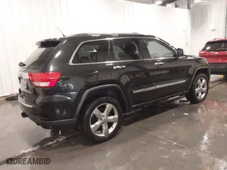 2011 Jeep Grand Cherokee Overland with VIN 1J4RR6GT7BC607735, listed as a IAAI auction lot 41830669 with 98,161 mi miles. Bid and sale history available at carsss.com. Image 4.