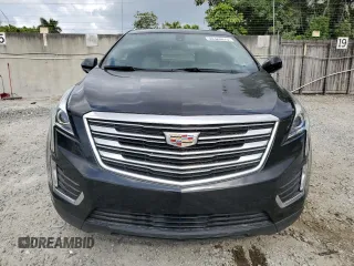 2019 Cadillac XT5 FWD with VIN 1GYKNARS4KZ113480, listed as a Copart auction lot 50328075 with 73,064 mi miles and Non Repairable. Bid and sale history available at carsss.com. Image 5.