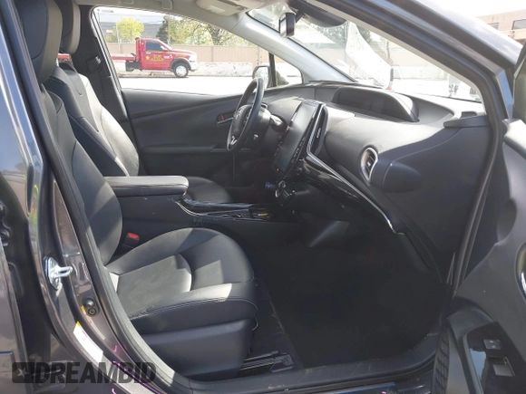 2022 Toyota Prius LE with VIN JTDKAMFP7N3206830, listed as a IAAI auction lot 41984239 with 57,681 mi miles and . Bid and sale history available at DreamBid. Image 5.