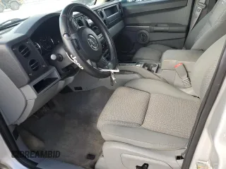 2006 Jeep Commander with VIN 1J8HH48K96C289162, listed as a Copart auction lot 80979074 with 170,581 mi miles and Salvage title. Bid and sale history available at DreamBid. Image 7.