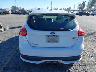2015 Ford Focus ST with VIN 1FADP3L92FL380352, listed as a IAAI auction lot 41365139 with 136,226 mi miles. Bid and sale history available at carsss.com. Image 17.