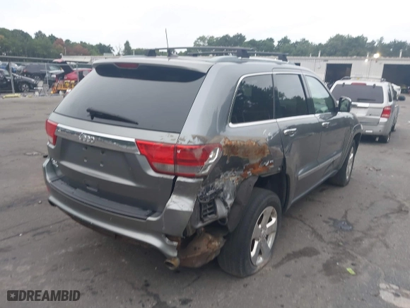 2011 Jeep Grand Cherokee Limited with VIN 1J4RR5GG6BC715356, listed as a IAAI auction lot 40158736 with 146,567 mi miles. Bid and sale history available at carsss.com. Image 4.