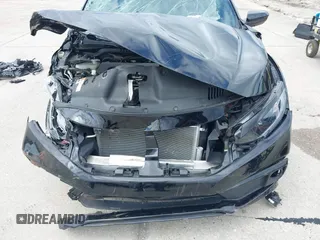 2019 Honda Civic Sport with VIN 19XFC2F85KE015159, listed as a IAAI auction lot 41993276 with 82,542 mi miles and . Bid and sale history available at DreamBid. Image 13.