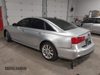 2013 Audi A6 3.0T Prestige with VIN WAUHGAFC9DN099395, listed as a IAAI auction lot 41958743 with 123,000 mi miles. Bid and sale history available at carsss.com. Image 3.