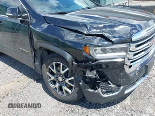 2023 GMC Acadia SLT with VIN 1GKKNMLS5PZ251525, listed as a IAAI auction lot 42266684 with 30,544 mi miles and . Bid and sale history available at DreamBid. Image 6.