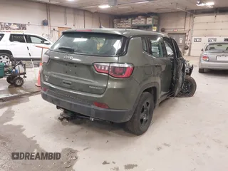 2020 Jeep Compass Sport with VIN 3C4NJDAB7LT132688, listed as a IAAI auction lot 41262430 with 91,167 mi miles and . Bid and sale history available at DreamBid. Image 4.