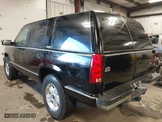 1996 Chevrolet Tahoe with VIN 1GNEK13R8TJ313125, listed as a IAAI auction lot 41361170 with 162,789 mi miles. Bid and sale history available at carsss.com. Image 3.