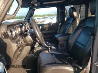 2021 Jeep Wrangler Unlimited Sahara High Altitude with VIN 1C4HJXEG0MW671105, listed as a Copart auction lot 74175244 with 51,610 mi miles and Salvage title. Bid and sale history available at DreamBid. Image 7.