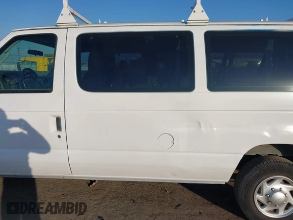 2011 Ford Econoline Passenger XL with VIN 1FBNE3BL0BDA75121, listed as a IAAI auction lot 41469640 with 105,558 mi miles. Bid and sale history available at carsss.com. Image 14.