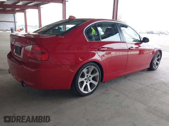 2007 BMW 3 Series 335i with VIN WBAVB73587P100572, listed as a IAAI auction lot 41409539 with 124,650 mi miles. Bid and sale history available at carsss.com. Image 4.