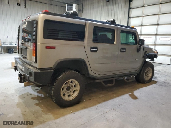 2004 Hummer H2 with VIN 5GRGN23U94H110447, listed as a Copart auction lot 41465315 with NaN miles and Salvage Title. Bid and sale history available at carsss.com. Image 3.