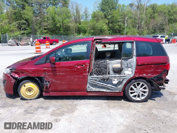 2012 Mazda 5 Grand Touring with VIN JM1CW2DL1C0123418, listed as a IAAI auction lot 42126956 with 112,411 mi miles and . Bid and sale history available at DreamBid. Image 14.