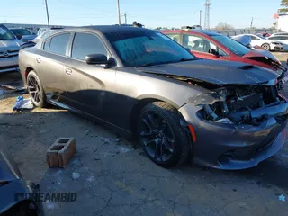 2019 Dodge Charger Scat Pack z VIN 2C3CDXGJ7KH522670, wystawiony jako IAAI lot #41146001 z przebiegiem 155 773 mil mil oraz . Historia ofert i sprzedaży dostępna na DreamBid. Obrazek 1.