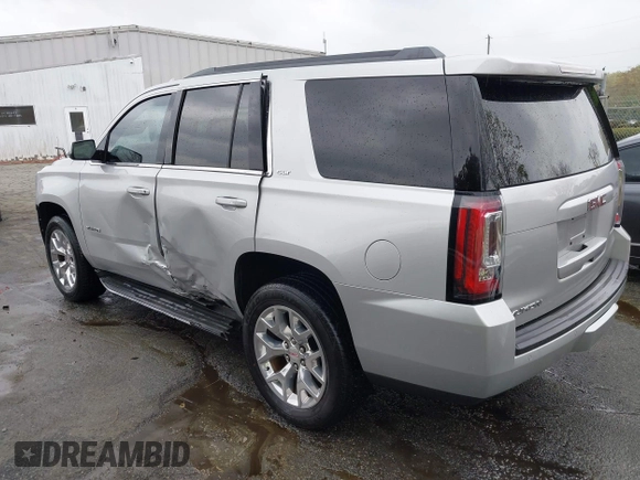 2015 GMC Yukon SLT with VIN 1GKS2BKC0FR676107, listed as a IAAI auction lot 41962929 with 132,389 mi miles. Bid and sale history available at carsss.com. Image 3.