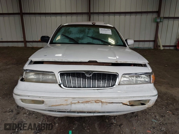 1997 Mercury Grand Marquis GS z VIN 2MELM74W6VX680292, wystawiony jako IAAI lot #42299154 z przebiegiem 208 666 mil mil oraz . Historia ofert i sprzedaży dostępna na DreamBid. Obrazek 11.