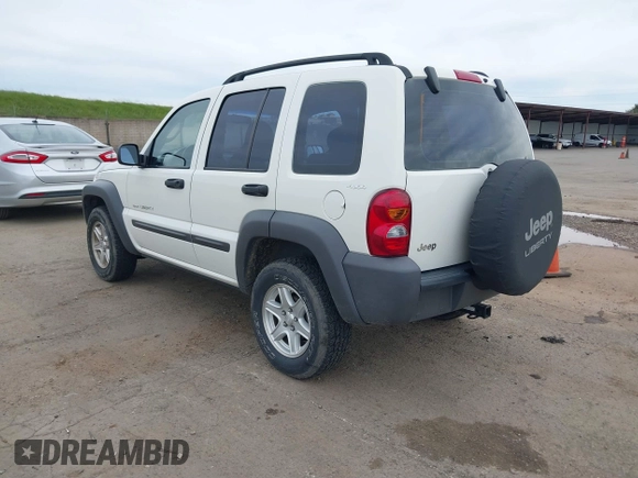 2002 Jeep Liberty Sport with VIN 1J4GL48K92W268896, listed as a IAAI auction lot 41788687 with 102,706 mi miles. Bid and sale history available at carsss.com. Image 3.