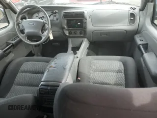 2003 Ford Explorer Sport Trac XLS with VIN 1FMZU67E33UA26245, listed as a Copart auction lot 47224405 with 113,009 mi miles and Salvage title. Bid and sale history available at DreamBid. Image 8.