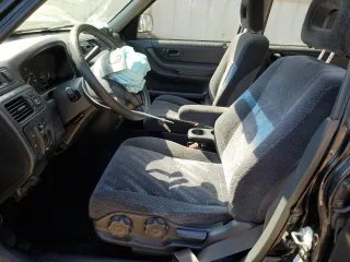 1999 Honda CR-V LX with VIN JHLRD2847XC021888, listed as a Copart auction lot 76556164 with 285,517 mi miles and Salvage Title. Bid and sale history available at carsss.com. Image 7.