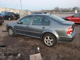 2004 Volkswagen Jetta GL with VIN 3VWRK69M74M002287, listed as a Copart auction lot 46682325 with 104,970 mi miles and Salvage title. Bid and sale history available at DreamBid. Image 2.