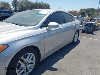 2013 Ford Fusion SE z VIN 3FA6P0HR7DR227402, wystawiony jako IAAI lot #42660169 z przebiegiem 98 853 mil mil oraz . Historia ofert i sprzedaży dostępna na DreamBid. Obrazek 6.