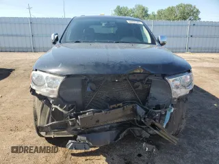 2013 Dodge Durango Crew with VIN 1C4RDJDG5DC701016, listed as a Copart auction lot 60832385 with 236,719 mi miles and Salvage title. Bid and sale history available at DreamBid. Image 5.