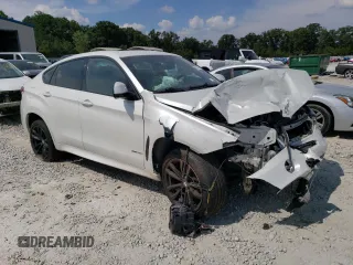 2019 BMW X6 xDrive35i with VIN 5UXKU2C52K0Z64679, listed as a Copart auction lot 69003673 with Not Provided miles. Bid and sale history available at carsss.com. Image 4.