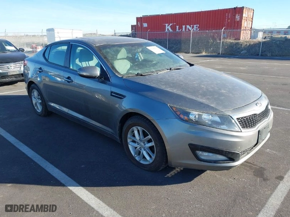 2013 Kia Optima LX with VIN 5XXGM4A72DG251290, listed as a IAAI auction lot 41386091 with 298,306 mi miles. Bid and sale history available at carsss.com. Image 1.