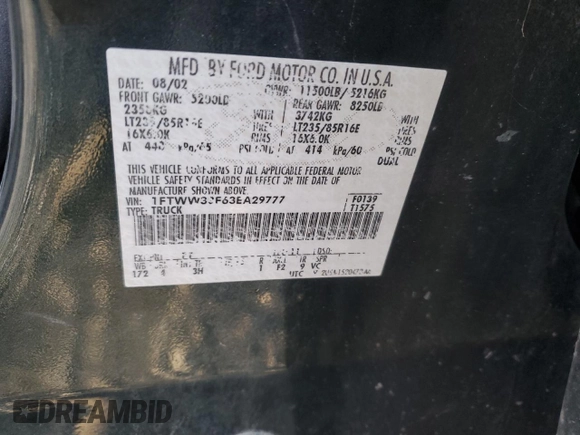 2003 Ford F-350 XL with VIN 1FTWW33F63EA29777, listed as a Copart auction lot 81047684 with 214,722 mi miles and Salvage Title. Bid and sale history available at DreamBid. Image 12.