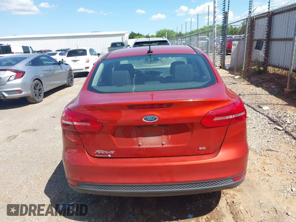 2018 Ford Focus SE z VIN 1FADP3F26JL321831, wystawiony jako IAAI lot #42085951 z przebiegiem 87 729 mil mil oraz . Historia ofert i sprzedaży dostępna na DreamBid. Obrazek 16.
