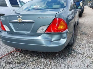 2001 Toyota Avalon XL z VIN 4T1BF28B01U138040, wystawiony jako IAAI lot #42320480 z przebiegiem 220 086 mil mil oraz . Historia ofert i sprzedaży dostępna na DreamBid. Obrazek 6.