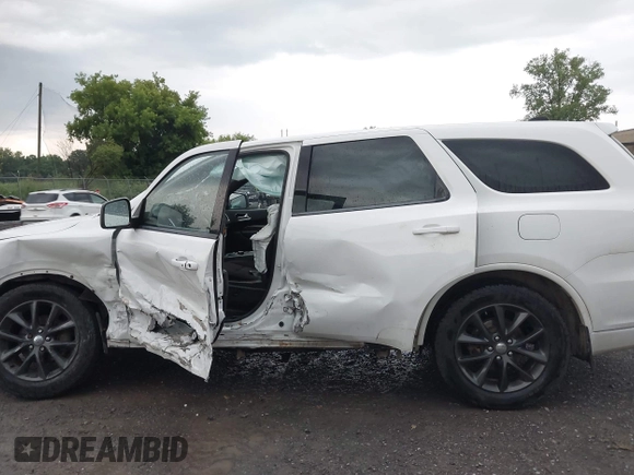 2014 Dodge Durango SXT with VIN 1C4RDJAG0EC561950, listed as a IAAI auction lot 42650331 with 106,959 mi miles and . Bid and sale history available at DreamBid. Image 15.