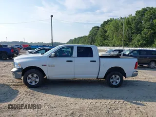 2018 Ram 1500 Tradesman with VIN 1C6RR7KM4JS297910, listed as a IAAI auction lot 42693431 with 68,403 mi miles and . Bid and sale history available at DreamBid. Image 14.