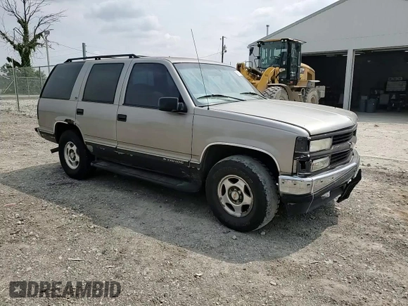 1999 Chevrolet Tahoe Z71 with VIN 1GNEK13R6XJ301562, listed as a Copart auction lot 59684595 with 200,561 mi miles and Salvage title. Bid and sale history available at DreamBid. Image 14.