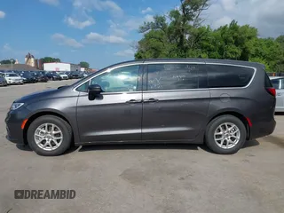 2023 Chrysler Pacifica Touring L with VIN 2C4RC1BG6PR612749, listed as a IAAI auction lot 42612932 with 69,931 mi miles and . Bid and sale history available at DreamBid. Image 14.