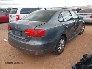 2012 Volkswagen Jetta SE with VIN 3VWDX7AJ0CM121106, listed as a IAAI auction lot 42624460 with 196,937 mi miles and . Bid and sale history available at DreamBid. Image 4.