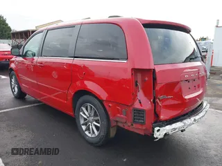 2014 Dodge Grand Caravan SXT with VIN 2C4RDGCG3ER257695, listed as a IAAI auction lot 41534568 with 116,896 mi miles and . Bid and sale history available at DreamBid. Image 3.