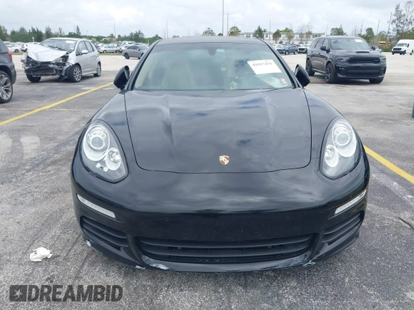 2015 Porsche Panamera S E-Hybrid z VIN WP0AD2A72FL040703, wystawiony jako IAAI lot #41937431 z przebiegiem 77 933 mil mil oraz . Historia ofert i sprzedaży dostępna na DreamBid. Obrazek 17.