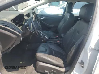 2015 Ford Focus SE with VIN 1FADP3F23FL319168, listed as a Copart auction lot 64411645 with 213,852 mi miles and Clean title. Bid and sale history available at DreamBid. Image 7.