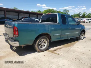 1998 Ford F-150 z VIN 1FTZX1768WNB23317, wystawiony jako Copart lot #52336895 z przebiegiem 288 431 mil mil oraz Szkoda całkowita • Salvage title. Historia ofert i sprzedaży dostępna na DreamBid. Obrazek 3.