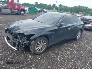 2015 Infiniti Q50 Premium with VIN JN1BV7AR8FM407956, listed as a IAAI auction lot 42724981 with 99,507 mi miles and . Bid and sale history available at DreamBid. Image 2.