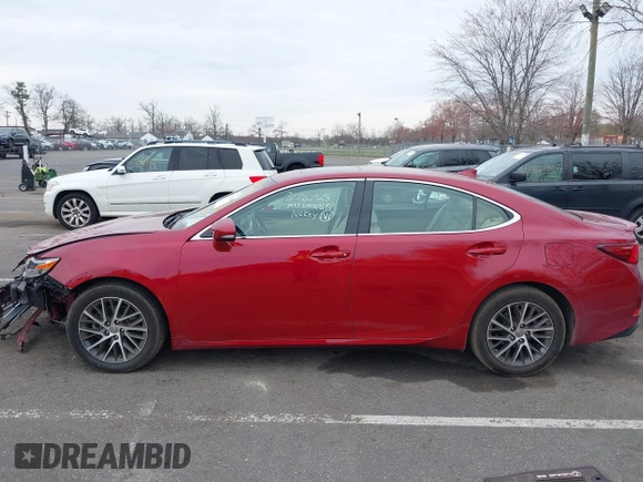 2016 Lexus ES 330 z VIN 58ABK1GG5GU024281, wystawiony jako IAAI lot #41913263 z przebiegiem 87 890 mil mil oraz . Historia ofert i sprzedaży dostępna na DreamBid. Obrazek 14.
