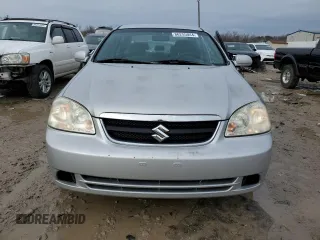 2006 Suzuki Forenza z VIN KL5JD56Z46K374920, wystawiony jako Copart lot #86255044 z przebiegiem 58 669 mil mil oraz Szkoda całkowita • Salvage title. Historia ofert i sprzedaży dostępna na DreamBid. Obrazek 5.