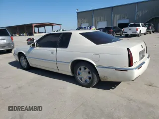 2000 Cadillac Eldorado z VIN 1G6EL12Y0YB702117, wystawiony jako Copart lot #80297854 z przebiegiem 124 851 mil mil oraz Szkoda całkowita • Salvage title. Historia ofert i sprzedaży dostępna na DreamBid. Obrazek 2.